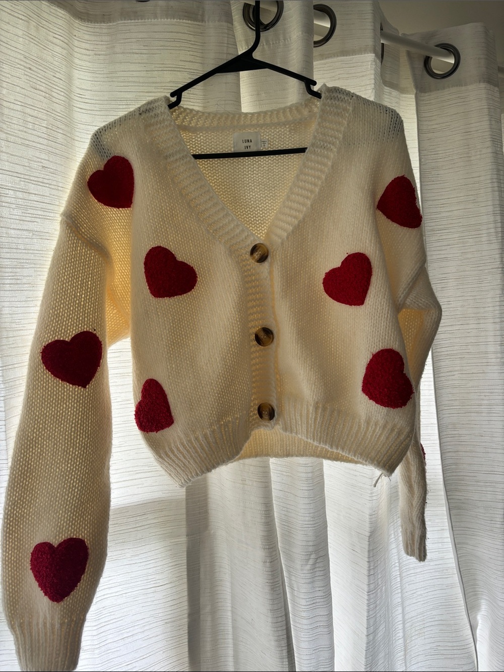 Ivory Cardigan with Red Heart Details